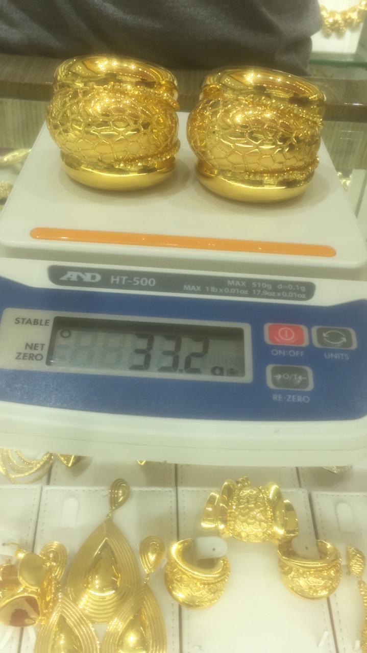 Pair of gold statement bands